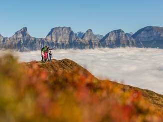 Family on the Flumserberg above the sea of fog Family on the Flumserberg above the sea of fog