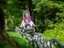 Mother and child on the Floomzer toboggan run