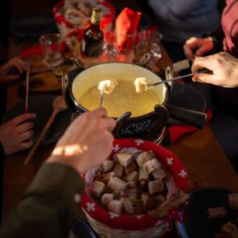 Cheese fondue © Heidiland Tourism / Kevin Wildhaber