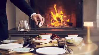Main course at Igniv in front of the fireplace Gourmet restaurant Igniv