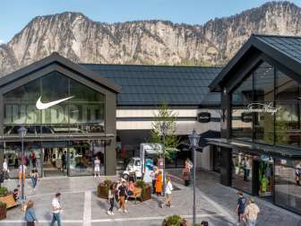 Nike Flagship Store at the Landquart Fashion Outlet, with the mountains in the background