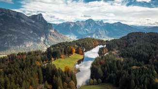 Lake Chapfensee in the fall Lake Chapfensee photographed from above in the fall light. The mountains of the Bündner Herrschaft can be seen in the background