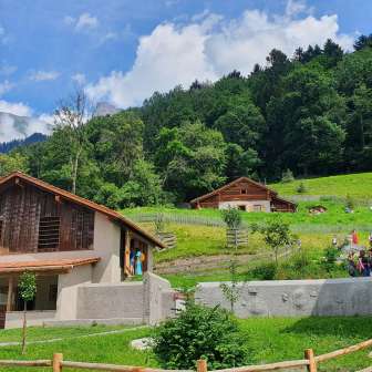 The Barn with Heidi's Alp Cottage in the background © Heididorf
