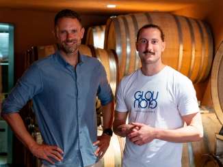 Winemaker Patrick Adank stands with presenter Rothmund in the Barique cellar of the Adank winery