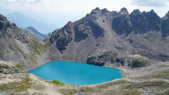 Turquoise-blue mountain lake at Pizol