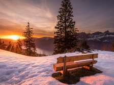 Sunbeds in winter with a view of Lake Walen