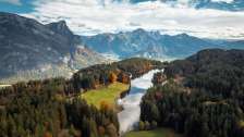 Lake Chapfensee photographed from above in the fall light. The mountains of the Bündner Herrschaft can be seen in the background