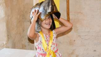 Girls on the children's trail at Sargans Castle A girl explores the children's trail in Sargans Castle.